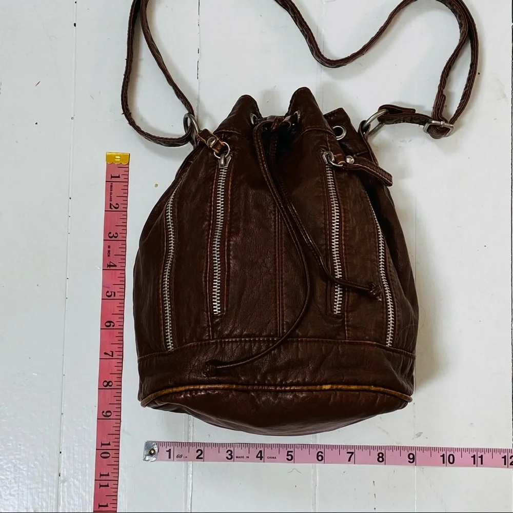 Faux leather bucket bag with zipper detail